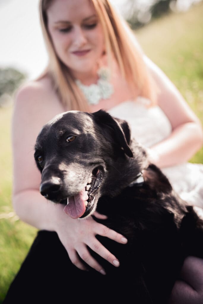 A woman and her black dog